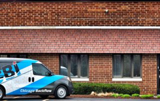 A CBI truck in front of our headquarters