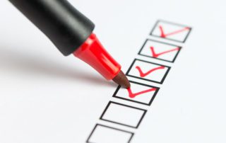 Checklist marked red with a red pen