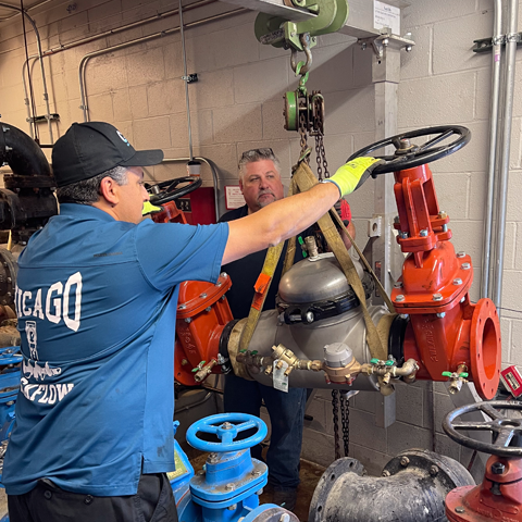 CBI inspector installing backflow device . install backflow devices to code. 