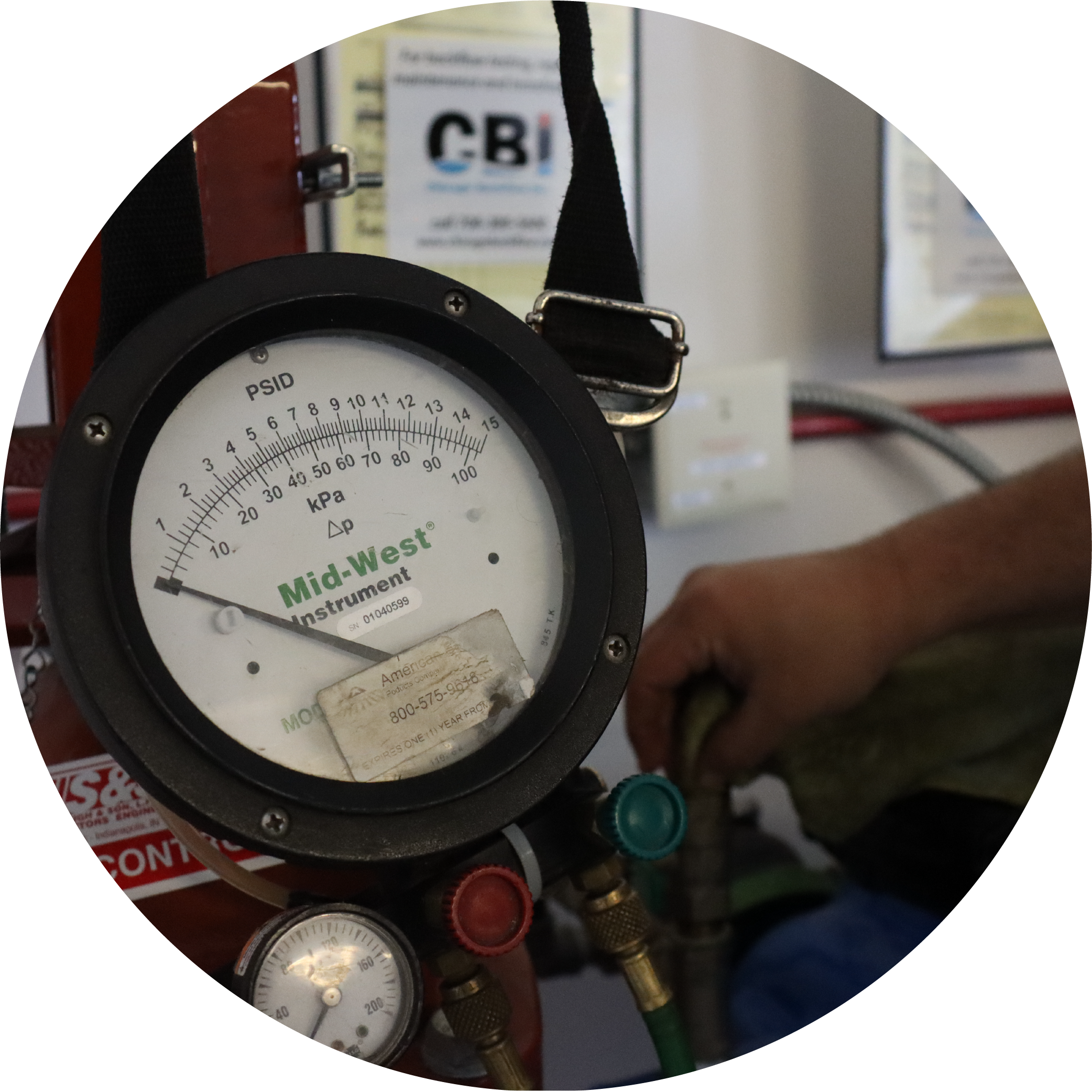 A test gauge that is being used on a backflow device.