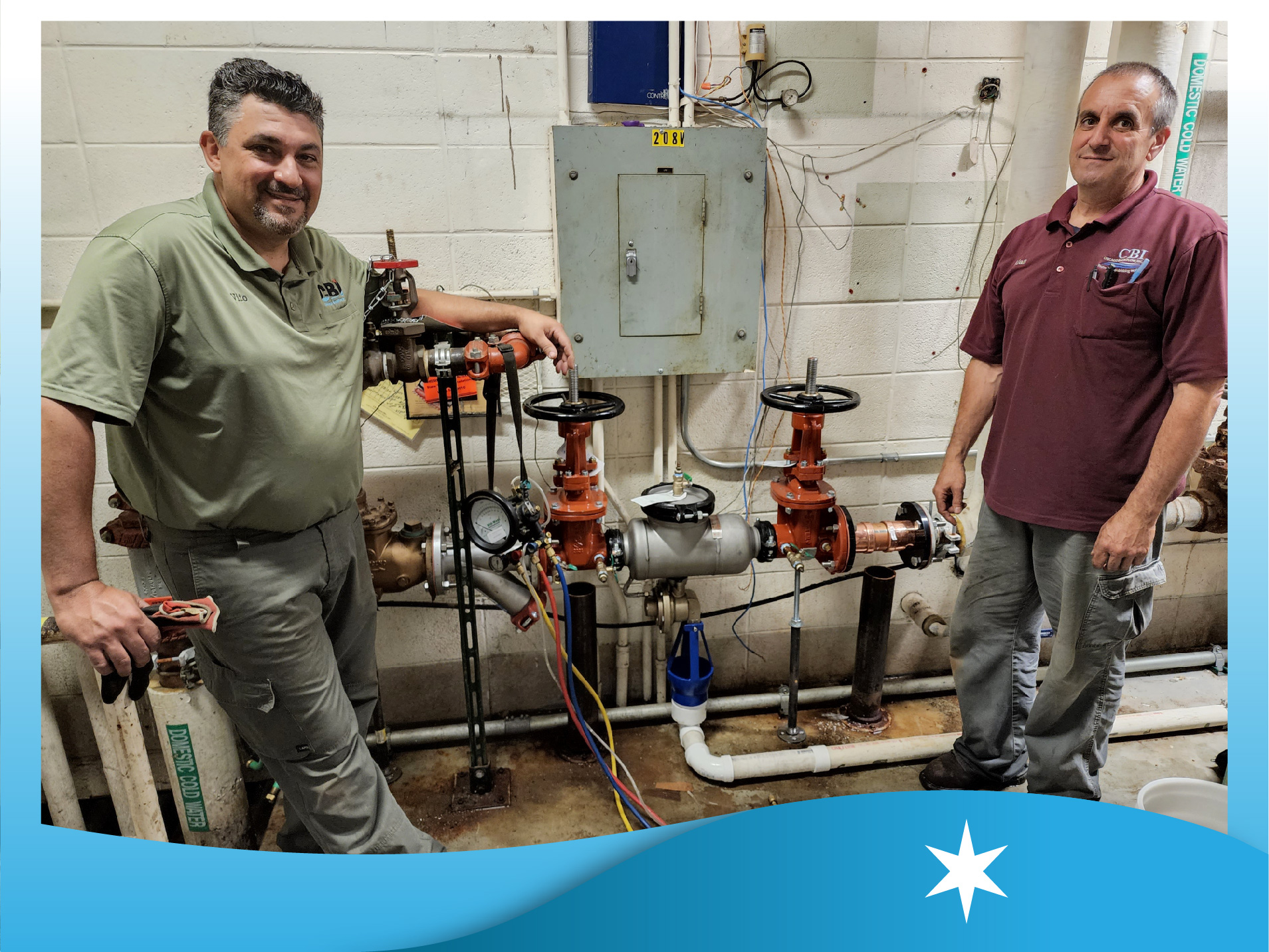 Two certified backflow testers just finishing a backflow test